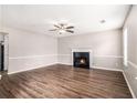 Spacious living room with fireplace, ceiling fan and attractive hardwood floors at 2549 Greenville Way, Decatur, GA 30034