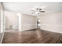 Spacious open living area with attractive hardwood floors and neutral wall colors at 2549 Greenville Way, Decatur, GA 30034