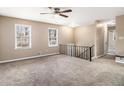 Spacious living room with neutral carpeting and large windows at 5257 Orly Ter, Atlanta, GA 30349
