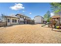 Spacious backyard with a playset, perfect for outdoor activities and entertaining at 1439 Mill Pointe Ct, Lawrenceville, GA 30043