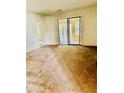 Bright living room with sliding glass doors leading to outdoor space at 207 Tiburon Dr, Stonecrest, GA 30038