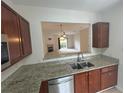 Convenient laundry area featuring a white washer and dryer with door to another room at 585 Mcwilliams Se Rd # 2602, Atlanta, GA 30315