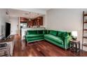 Comfortable living room with rich hardwood floors and contemporary furnishings at 201 W Ponce De Leon Ave # 315, Decatur, GA 30030