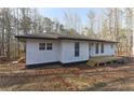 Charming single-story home with a new deck and freshly painted exterior at 4289 Post Rd, Winston, GA 30187