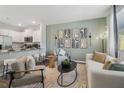 Inviting living room with stylish furniture, a kitchen bar, and a view of the neighborhood at 2270 Jamin Bnd # 12, Lithonia, GA 30058