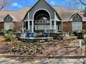 Clubhouse exterior with water feature and well-maintained landscaping at 1101 Mcgill Park Ne Ave # 1101, Atlanta, GA 30312