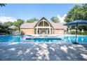 Sparkling community pool with plenty of seating and lush surroundings at 1101 Mcgill Park Ne Ave # 1101, Atlanta, GA 30312