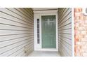 Close-up of a front door with side window at 916 Santa Anita Dr, Woodstock, GA 30189