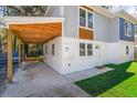 Features include covered parking, freshly painted block foundation, nicely manicured lawn and front door access at 1270 Graymont Sw Dr, Atlanta, GA 30310