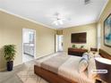 Staged main bedroom with en-suite bathroom, plush carpet, and modern furnishings at 185 Stayman Park, Fayetteville, GA 30215