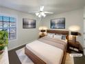 Tastefully staged main bedroom featuring a modern bed frame and complementary artwork at 4028 Elm Trace Dr, Loganville, GA 30052