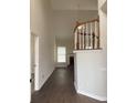 Bright entryway featuring wood floors, staircase, and vaulted ceilings at 1630 Stonehaven, Cumming, GA 30040