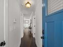 Inviting hallway with modern lighting and hardwood floors at 495 Woodlawn Ave, Atlanta, GA 30318