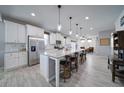 Spacious kitchen with granite countertops, stainless steel appliances, and a large island at 5160 Meridian Pass, Cumming, GA 30028