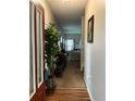 Spacious entryway with a decorative plant and an open view to the living room at 1281 Rockfield Cir, Norcross, GA 30093