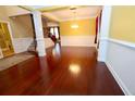 Spacious living room with hardwood floors and an open layout at 460 Chandler Bluff Ct, Grayson, GA 30017