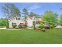 Attractive home with a well-kept lawn and appealing architectural details at 1870 Shoreline Trce, Grayson, GA 30017