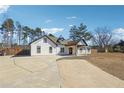 Spacious property boasting a long driveway and a beautifully designed two-story home at 1243 Old Villa Rica Rd, Dallas, GA 30157