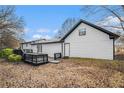 A backyard featuring a deck, perfect for outdoor entertaining and relaxation at 441 Village Way, Lawrenceville, GA 30046