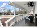 Inviting front porch with comfortable seating, perfect for enjoying the outdoors at 541 Benmac Se Rd, Smyrna, GA 30080