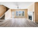 Bright living room with wood floors, fireplace, and plenty of natural light at 2845 Briaroak Dr, Duluth, GA 30096