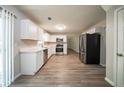 Bright kitchen featuring stainless steel appliances, sleek countertops, and stylish flooring at 3534 S Portsmouth Cir, Lithonia, GA 30038