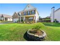 Charming two-story brick home with manicured lawn and landscaping at 1159 Fort Marcy Park, Lawrenceville, GA 30044
