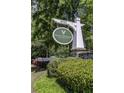 Vinings Vineyard Condominiums sign with address 4100, surrounded by greenery at 4100 Paces Se Walk # 3205, Atlanta, GA 30339