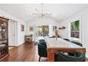 Dining room with stylish lighting, elegant decor, and a large dining table at 1309 Arnold Ne Ave, Atlanta, GA 30324