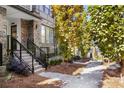 Charming townhome entrance with well-maintained landscaping and inviting staircase at 383 Pratt Se Dr # 503, Atlanta, GA 30315