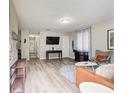 Bright living room featuring hardwood floors, neutral walls, and modern furniture at 1351 Eason Nw St, Atlanta, GA 30314