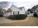 Charming one-story home featuring a brick-accented garage and well-kept greenery at 2800 Barnwood Xing, Duluth, GA 30097