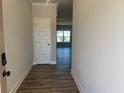 Inviting entryway showcasing the front door and wood-look flooring leading into the home at 4371 Portsbrook Ave, Snellville, GA 30039