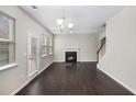 Living room with hardwood floors, fireplace and lots of natural light at 196 Foggy Creek Lane Ln, Hiram, GA 30141