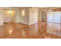 Bright living room with hardwood floors, dining area and natural light at 3301 Henderson Mill Rd, Atlanta, GA 30341