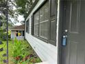 Close-up of the home's entrance, featuring colorful flowers and a well-maintained front door at 1298 Belmont Se Ave, Smyrna, GA 30080