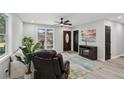 Comfortable living room showcasing modern decor, a sleek entertainment center, and a vibrant area rug at 2166 Ohara Se Pl, Atlanta, GA 30315