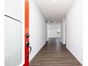 Inviting entryway with modern flooring and a brightly colored front door at 708 Ocmulgee Xing, Locust Grove, GA 30248