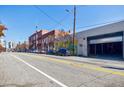 Building exterior with street parking, building and street mural art on adjacent building at 244 Peters St # 23, Atlanta, GA 30313