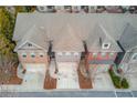 An elevated view of the townhouse complex shows matching architecture and well-maintained landscaping at 2275 W Village Se Ln, Smyrna, GA 30080