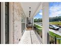 Inviting outdoor living space on a covered porch, great for relaxing at 175 Basil St, Cumming, GA 30040