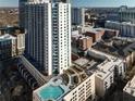 Modern high-rise with a rooftop pool and lush green area at 860 Peachtree Ne St # 917, Atlanta, GA 30308