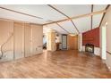 Large living room with a fireplace and hardwood floors at 4166 Hall Se St, Acworth, GA 30102