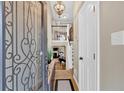 Elegant foyer boasting an ornate iron door and views of the home's interior at 4144 D Youville Trce, Atlanta, GA 30341