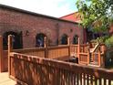 Charming brick exterior with a wooden deck and elegant ironwork at 184 Sw Walker Street # E, Atlanta, GA 30313