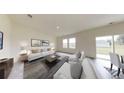 Spacious living room filled with natural light, perfect for relaxing and entertaining guests at 7728 Sudbury Cir, Covington, GA 30014