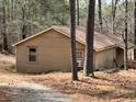 Additional outbuilding offers potential for a workshop or extra storage space at 8395 Atlanta Newnan Rd, Chattahoochee Hills, GA 30268