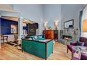 Stylish living room with tall ceilings, fireplace, and modern decor creates a welcoming atmosphere at 1600 Brisbane Drive, Dacula, GA 30019