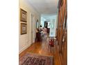 Elegant hallway showcasing hardwood floors and classic decor at 2392 Ivy Mountain Dr, Snellville, GA 30078
