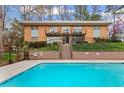 Full view of the in-ground pool at 1235 Woodland Ne Ave # 1, Atlanta, GA 30324